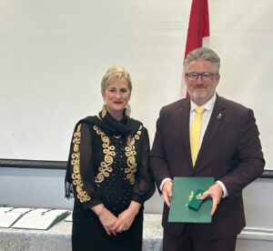 Adèle Poratto & MP Blaine Calkins with the presentation of the King Charles the 111 Coronation Medal